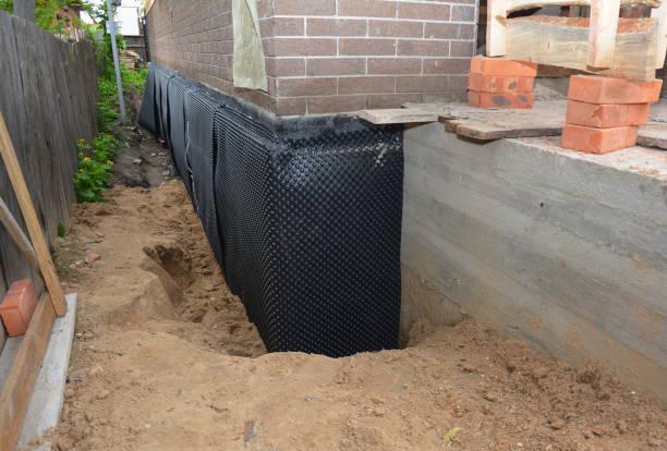 SJ Waterproofing Pros technician performing targeted Waterproofing assessment in South Plainfield, NJ